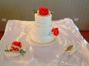 Three Tier Wedding Cake with red roses