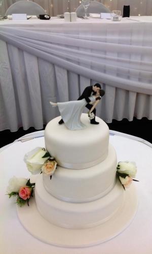 Fondant 3 tier Wedding Cake artificial flowers.