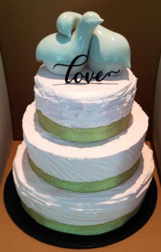 Buttercream textured 3 tier gold ribbon Wedding Cake.