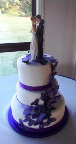 Fondant 3 tier purple butterflies Wedding Cake.