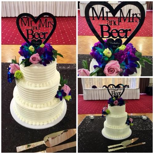 Buttercream 3 tier with fresh flowers Wedding Cake.